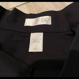 Black ruffled mini skirt with nude trim